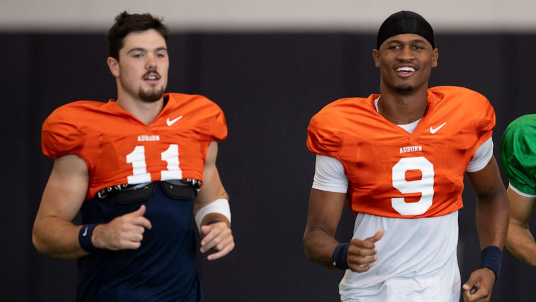 Auburn Tigers quarterbacks Jackson Arnold (11) and Deuce Knight (9) take the field during practice at Woltosz Football Performance Center in Auburn, Ala., on Tuesday, Sept. 2, 2025. Auburn Tigers quarterbacks Jackson Arnold (11) and Deuce Knight (9) take the field during practice at Woltosz Football Performance Center in Auburn, Ala., on Tuesday, Sept. 2, 2025.
