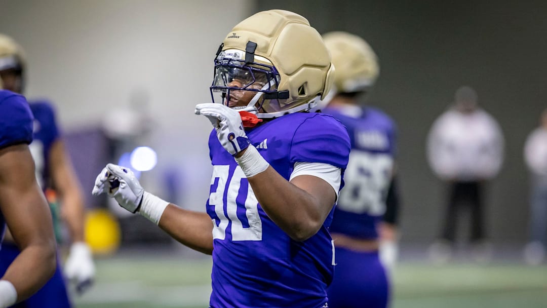 Ansu Sanoe carries a 6-foot-2, 241-pound running-back frame. 