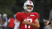 Bills Josh Allen laughs as he jokes with teammates as he moves to another practice field with other offensive players during Bills training camp at St. John Fisher University in Pittsford, NY on Aug. 5, 2024.