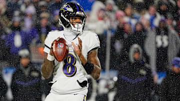Baltimore Ravens quarterback Lamar Jackson gets ready to launch the ball during first half action at the Buffalo Bills.