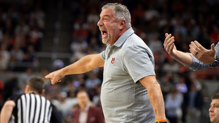 Auburn Tigers head coach Bruce Pearl talks with his team as Auburn Tigers take on Arkansas Razorbacks at Neville Arena in Auburn, Ala., on Wednesday, Feb. 19, 2025.