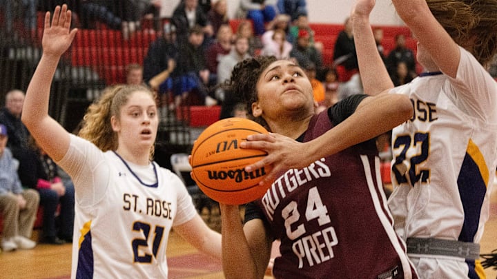 Prep   s GiGi Battle drives in toward the basket against St. Rose   s Caroline Conforti. Rutgers Prep Girls Basketball vs. St. Rose in NJSIAA Non-Public Sectional finals at Jackson Liberty High School in Jackson NJ on March 4, 2024.