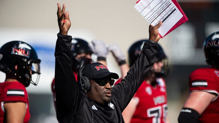 Northern Illinois Huskies head coach Thomas Hammock signals for a touchdown during a review as Arkansas State Red Wolves take on the Northern Illinois Huskies during the Camellia Bowl at Cramton Bowl in Montgomery, Ala., on Saturday, Dec. 23, 2023. Northern Illinois Huskies leads Arkansas State Red Wolves 21-13.
