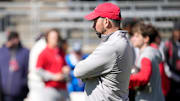 Ohio State Buckeye head coach Ryan Day watches his team warm up before the start of the spring game at Ohio Stadium on April 12, 2025.