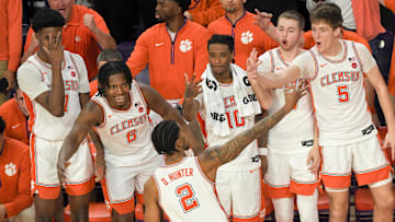 Feb 8, 2025; Clemson, South Carolina, USA; Clemson Tigers guard Dillon Hunter (2) reacts with teammates after making a three point shot against Duke Blue Devils during the second half at Littlejohn Coliseum. 