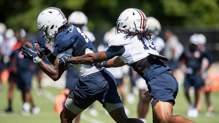 Auburn Tigers wide receiver Cam Coleman (8) catches a pass during practice at Woltosz Football Performance Center in Auburn, Ala. on Tuesday, Aug. 19, 2025.