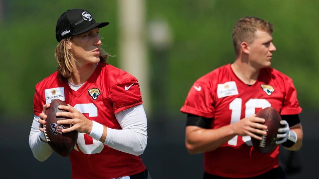 Jacksonville Jaguars quarterback Trevor Lawrence (16) and quarterback Mac Jones (10) look to pass during an organized team activity Tuesday, May 28, 2024 at EverBank Stadium’s Miller Electric Center in Jacksonville, Fla.