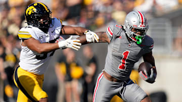 Oct 5, 2024; Columbus, OH, USA; Ohio State Buckeyes running back Quinshon Judkins (1) gets past Iowa Hawkeyes linebacker Kyler Fisher (37) on a run in the first quarter during the NCAA football game at Ohio Stadium.