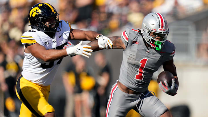 Oct 5, 2024; Columbus, OH, USA; Ohio State Buckeyes running back Quinshon Judkins (1) gets past Iowa Hawkeyes linebacker Kyler Fisher (37) on a run in the first quarter during the NCAA football game at Ohio Stadium.