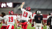 Central Phenix City's Andrew Alford (13) celebrates with his team as Central Phenix City faces Thompson in the Class 7A football state championship at Bryant-Denny Stadium in Tuscaloosa, Ala., on Wednesday, Dec. 6, 2023. Central Phenix City defeated Thompson 21-19.