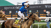 Junior Alvarado celebrates after riding Sovereignty to victory in the 151st Kentucky Derby at Churchill Downs in Louisville, Kentucky on May 3, 2025