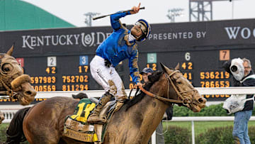 Junior Alvarado celebrates after riding Sovereignty to victory in the 151st Kentucky Derby at Churchill Downs in Louisville, Kentucky on May 3, 2025