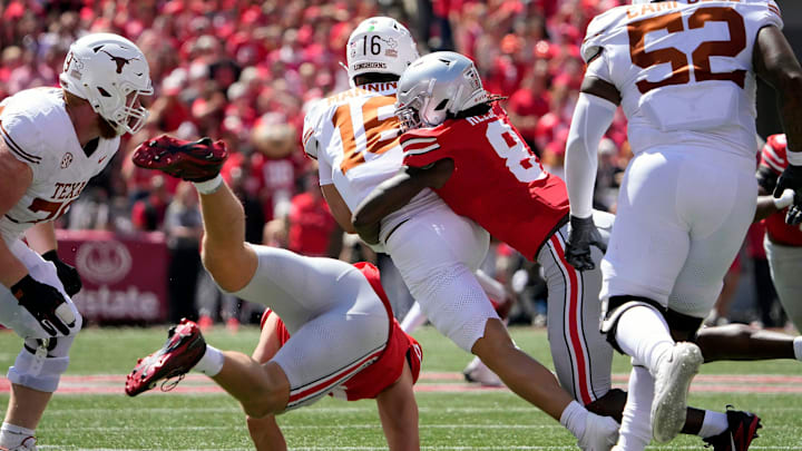 Ohio State Buckeyes linebacker Arvell Reese (8) tackles Texas Longhorns quarterback Arch Manning (16) on a run in the first quarter of their game at Ohio Stadium in Columbus, Ohio on Aug 30, 2025.