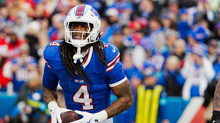 Buffalo Bills running back James Cook (4) smiles after running into the end zone for a touchdown during second half action at the Bills home game against the New York Jets at Highmark Stadium in Orchard Park on Dec. 29, 2024. Buffalo Bills running back James Cook (4) smiles after running into the end zone for a touchdown during second half action at the Bills home game against the New York Jets at Highmark Stadium in Orchard Park on Dec. 29, 2024.