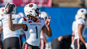 Arkansas State Red Wolves quarterback Jaylen Raynor (1) warms up before Arkansas State Red Wolves take on the Northern Illinois Huskies during the Camellia Bowl at Cramton Bowl in Montgomery, Ala., on Saturday, Dec. 23, 2023.