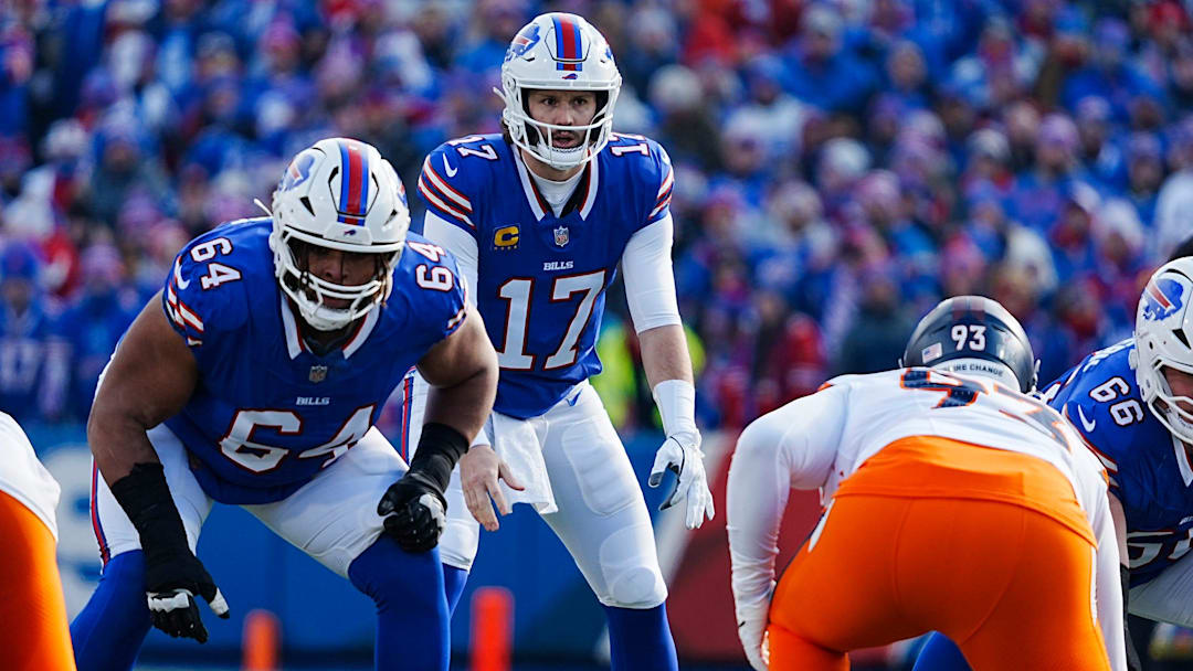 Buffalo Bills quarterback Josh Allen eyes how the Denver Broncos are lined up as he calls the play during the first half of the Buffalo Bills wild card game against the Denver Broncos at Highmark Stadium in Orchard Park on Jan. 12, 2025.