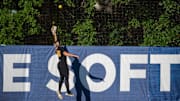 A home run ball flies over the head of Missouri Tigers outfielder Alex Honnold (25) during the SEC softball tournament championship game at Jane B. Moore Field in Auburn, Ala., on Saturday, May 11, 2024. Florida Gators defeated Missouri Tigers 6-1.