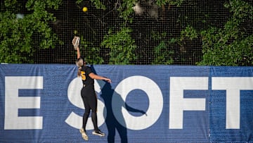 A home run ball flies over the head of Missouri Tigers outfielder Alex Honnold (25) during the SEC softball tournament championship game at Jane B. Moore Field in Auburn, Ala., on Saturday, May 11, 2024. Florida Gators defeated Missouri Tigers 6-1.