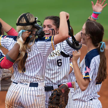 Saint James players celebrate victory during the AHSAA regional softball tournament at Lagoon Park in Montgomery, Ala., on Thursday, May 9, 2024. Saint James defeated Alabama Christian 11-6.