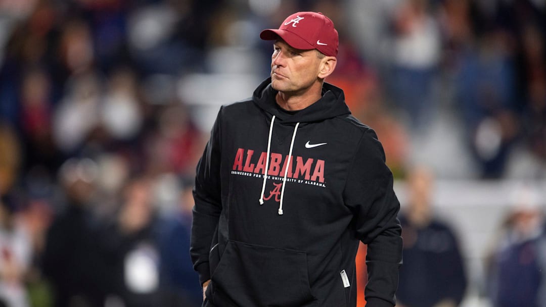 Alabama Crimson Tide head coach Kalen DeBoer watches on during warm ups before Auburn Tigers take on Alabama Crimson Tide at Jordan-Hare Stadium in Auburn, Ala. on Saturday, Nov. 29, 2025.