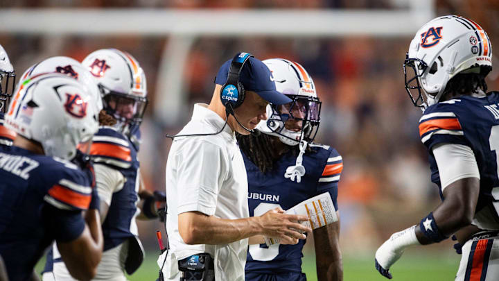 Auburn Tigers defensive coordinator DJ Durkin huddles with his team as Auburn Tigers take on Ball State Cardinals at Jordan-Hare Stadium in Auburn, Ala. on Saturday, Sept. 6, 2025. Auburn Tigers defeated Ball State Cardinals 42-3.