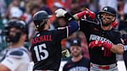 Minnesota Twins second base Luke Keaschall (15), left, celebrates after batting 2-run home run against Detroit Tigers during the first inning at Comerica Park in Detroit in Tuesday, August 5, 2025.