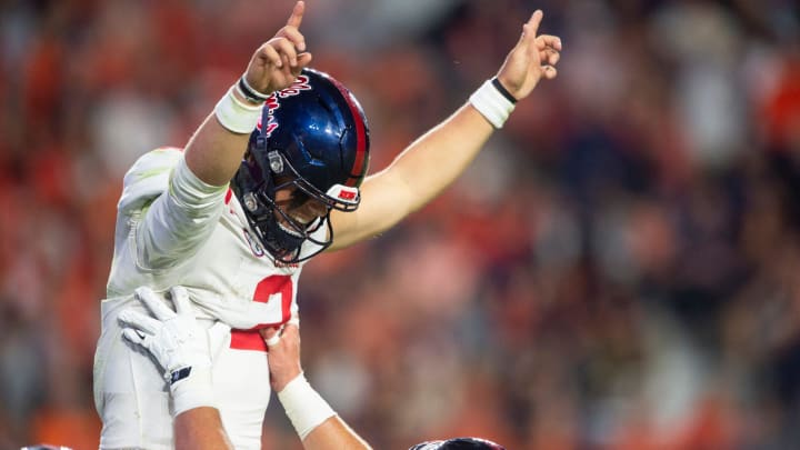 Mississippi Rebels quarterback Jaxson Dart (2) celebrates his touchdown run as Auburn Tigers take on Mississippi Rebels at Jordan-Hare Stadium in Auburn, Ala., on Saturday, Oct. 21, 2023.