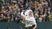 Jan 7, 2024; Green Bay, Wisconsin, USA;  Chicago Bears quarterback Justin Fields (1) looks to throw a pass during the fourth quarter against the Green Bay Packers at Lambeau Field. 
