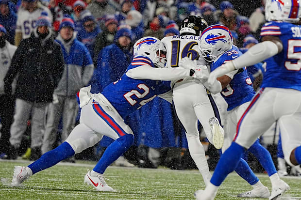 Buffalo Bills safety Cole Bishop makes a tackle against the Baltimore Ravens.