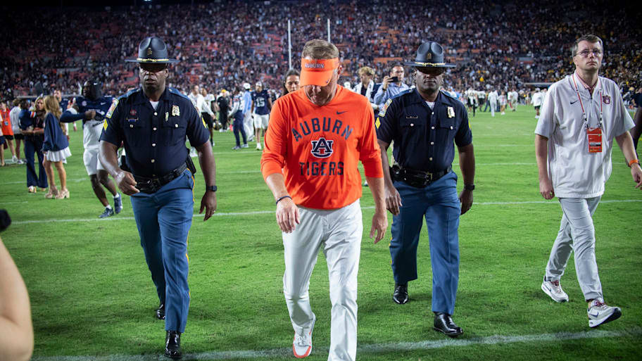 Auburn Tigers head coach Hugh Freeze walks off the field