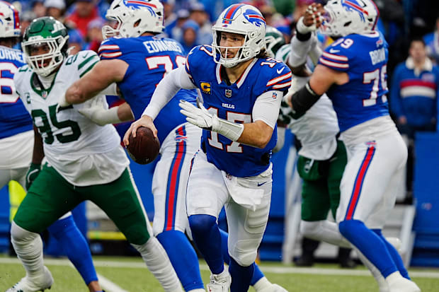 Buffalo Bills QB Josh Allen runs with the ball against the New York Jets at Highmark Stadium. Buffalo Bills QB Josh Allen runs with the ball against the New York Jets at Highmark Stadium.
