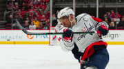 Apr 5, 2024; Raleigh, North Carolina, USA; Washington Capitals left wing Alex Ovechkin (8) takes a shot against the Carolina Hurricanes during the second period at PNC Arena. Mandatory Credit: James Guillory-USA TODAY Sports
