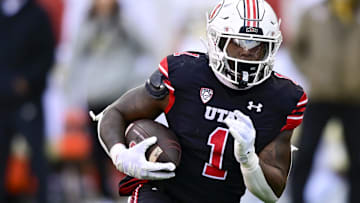 Utah Utes running back Jaylon Glover (1) runs the ball downfield against the Colorado Buffaloes at Rice-Eccles Stadium. Mandatory Credit: Christopher Creveling-Imagn Images