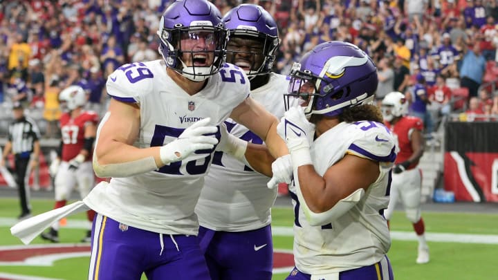 Sep 19, 2021; Glendale, Arizona, USA; Minnesota Vikings outside linebacker Nick Vigil (59) celebrates after returning an interception for a touchdown against the Arizona Cardinals during the second half at State Farm Stadium.