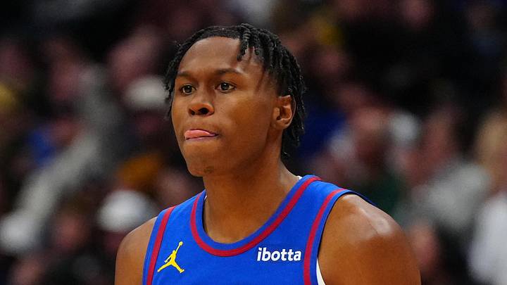 Nov 8, 2024; Denver, Colorado, USA; Denver Nuggets forward Peyton Watson (8) reacts to his three point basket in the second half against the Miami Heat at Ball Arena. Mandatory Credit: Ron Chenoy-Imagn Images