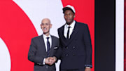 Jun 25, 2025; Brooklyn, NY, USA;  Derik Queen stands with NBA commissioner Adam Silver after being selected as the 13th pick by the Atlanta Hawks in the first round of the 2025 NBA Draft at Barclays Center. 