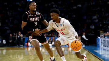 Houston's Mylik Wilson (with ball)