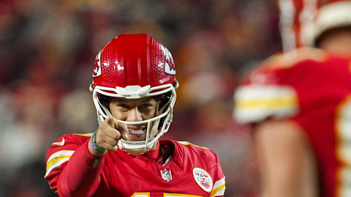 Kansas City Chiefs quarterback Patrick Mahomes points to Travis Kelce against the Los Angeles Chargers on Dec. 8, 2024.