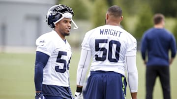 Jun 13, 2017; Renton, WA, USA; Seattle Seahawks middle linebacker Bobby Wagner (54) talks with outside linebacker K.J. Wright (50) during a minicamp practice at the Virginia Mason Athletic Center. 