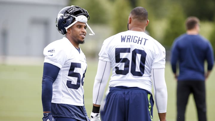 Jun 13, 2017; Renton, WA, USA; Seattle Seahawks middle linebacker Bobby Wagner (54) talks with outside linebacker K.J. Wright (50) during a minicamp practice at the Virginia Mason Athletic Center. Jun 13, 2017; Renton, WA, USA; Seattle Seahawks middle linebacker Bobby Wagner (54) talks with outside linebacker K.J. Wright (50) during a minicamp practice at the Virginia Mason Athletic Center.
