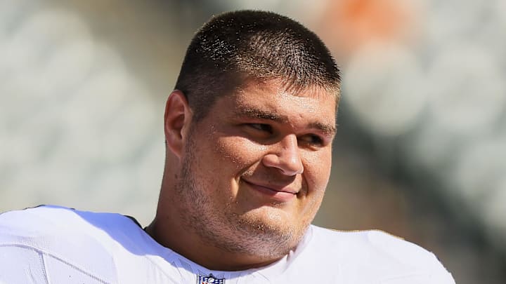Oct 6, 2024; Cincinnati, Ohio, USA; Baltimore Ravens center Tyler Linderbaum (64) during warmups before the game against the Cincinnati Bengals at Paycor Stadium. Mandatory Credit: Katie Stratman-Imagn Images