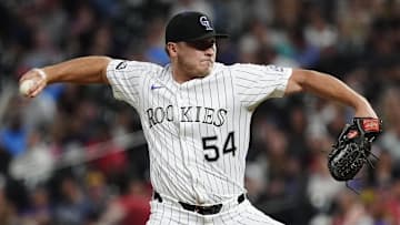 Jul 22, 2025; Denver, Colorado, USA; Colorado Rockies relief pitcher Seth Halvorsen (54) delivers a pitch in the ninth inning against the St. Louis Cardinals at Coors Field.