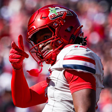 Oct 4, 2025; Tucson, Arizona, USA; Arizona Wildcats wide receiver Tre Spivey (12) celebrates after a play during the third quarter of the game against the Oklahoma State Cowboys at Arizona Stadium. Mandatory Credit: Aryanna Frank-Imagn Images