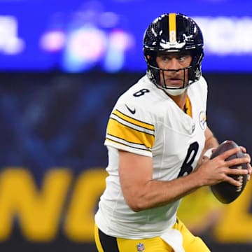 Nov 9, 2025; Inglewood, California, USA; Pittsburgh Steelers quarterback Aaron Rodgers (8) scrambles with the ball against the Los Angeles Chargers during the first quarter of the game at SoFi Stadium. Mandatory Credit: Gary A. Vasquez-Imagn Images
