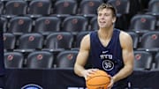 Mar 26, 2025; Newark, NJ, USA; Brigham Young Cougars guard Dallin Hall (30) warms up during a practice session in preparation for an East Regional semifinal game against the Alabama Crimson Tide at Prudential Center. Mandatory Credit: Vincent Carchietta-Imagn Images