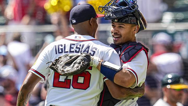 Apr 1, 2026; Cumberland, Georgia, USA; Atlanta Braves pitcher Raisel Iglesias (26) and catcher Drake Baldwin (30) react after the Braves defeated the Athletics at Truist Park.