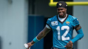 Jacksonville Jaguars wide receiver Travis Hunter has a laugh after the seventh organized team activity.
