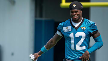 Jacksonville Jaguars wide receiver Travis Hunter has a laugh after the seventh organized team activity.