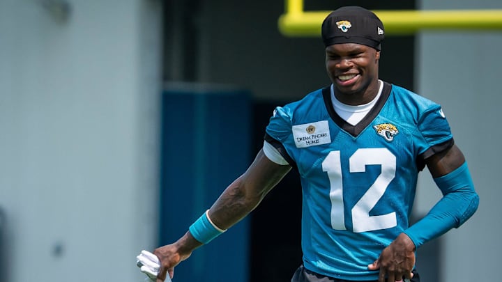 Jacksonville Jaguars wide receiver Travis Hunter has a laugh after the seventh organized team activity. Jacksonville Jaguars wide receiver Travis Hunter has a laugh after the seventh organized team activity.
