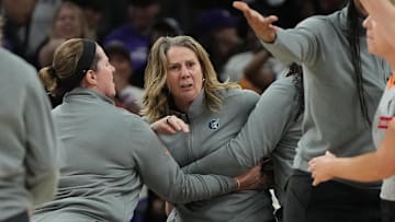 Sep 26, 2025; Phoenix, Arizona, USA; Minnesota Lynx head coach Cheryl Reeve is held back after being ejected during game three against the Phoenix Mercury of the second round for the 2025 WNBA Playoffs at PHX Arena. Mandatory Credit: Rick Scuteri-Imagn Images